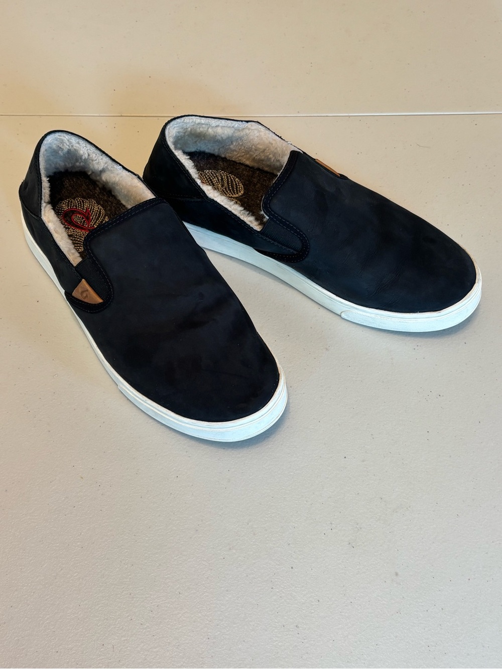 Olukai Pehuea Heu Black Slip-On Shearling-Lined Sneakers